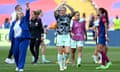 Millie Bright (centre) acknowledges the fans alongside Chelsea manager Emma Hayes after the team's victory against Barcelona.