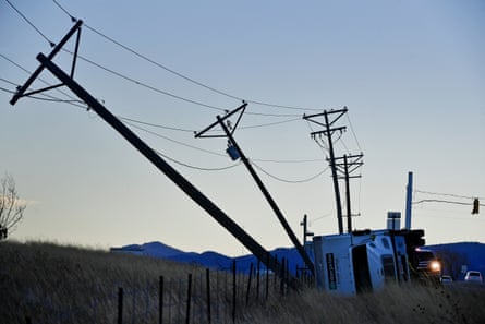 An overturned truck pushed high power lines over along Highway 93 in Superior, Colorado in December.