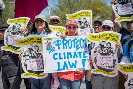 people holding signs
