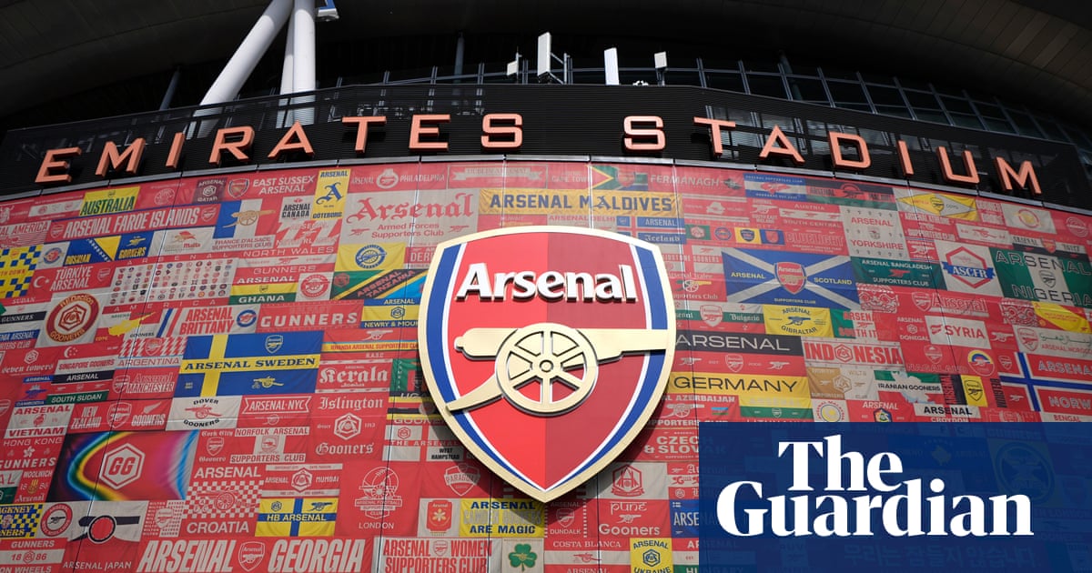 Exterior view of the Emirates Stadium showing the Arsenal stadium facade on a matchday.