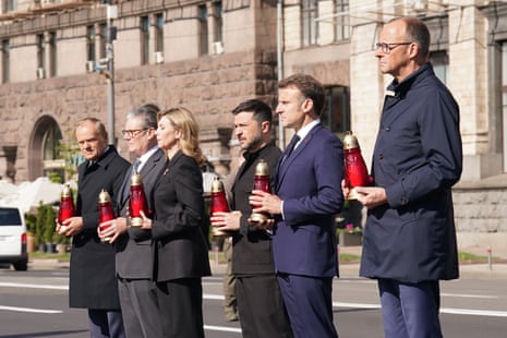 Poland’s Donald Tusk, the UK’s Keir Starmer, Ukraine’s Volodymyr Zelenskyy and his wife, Olena Zelenska, France’s Emmanuel Macron and Germany’s Friedrich Merz in Kyiv’s Maidan.
