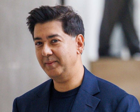 Imran Ahmed in a navy blue blazer and blue shirt