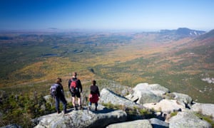 Hikers looking out over Baxter State/Province Park from Mt Katahdin.