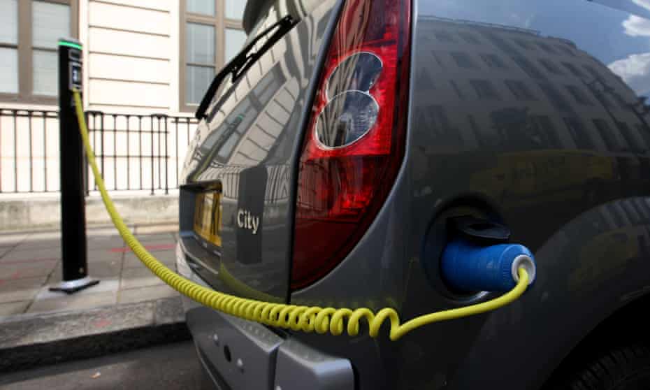 An electric car being recharged