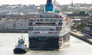 Cruise Ship Saga Sapphire being pulled away from cruise terminal by tug, at Stockholm Sweden.
