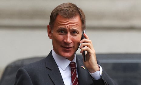Jeremy Hunt using his mobile phone