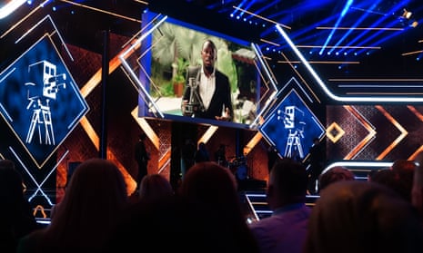 Usain Bolt receives his lifetime achievement award via video link.