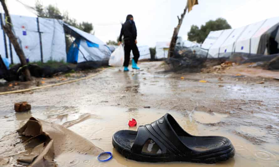 An abandoned flip flop in the mud at Moria camp