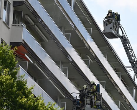 Firefighters pictured at the scene of a fire in an apartment building in the August Vermeylenlaan street in Antwerp.