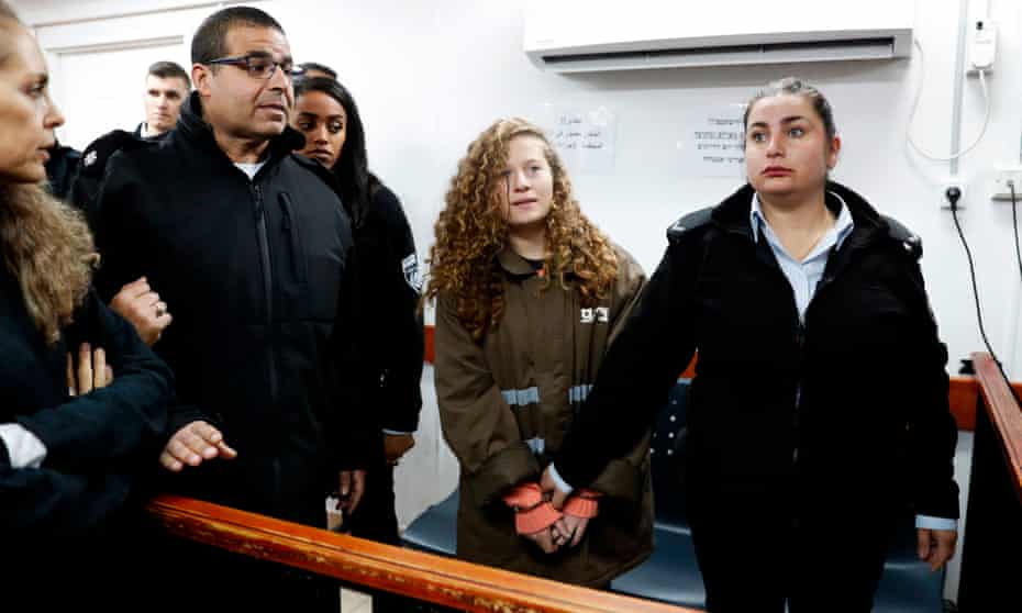 Ahed Tamimi stands for a hearing in the military court at Ofer military prison in the West Bank.