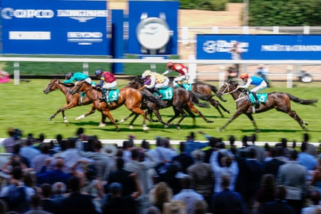 Oisin Murphy riding Moonrise (left), turquiose) wins The Princess Margaret Japan Cup Stakes at Ascot Racecourse.