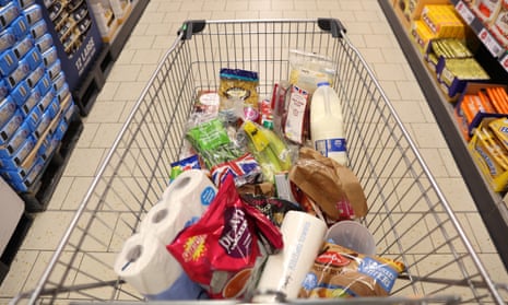 A shopping trolley filled with groceries at a Lidl supermarket in Newcastle Under Lyme, England.
