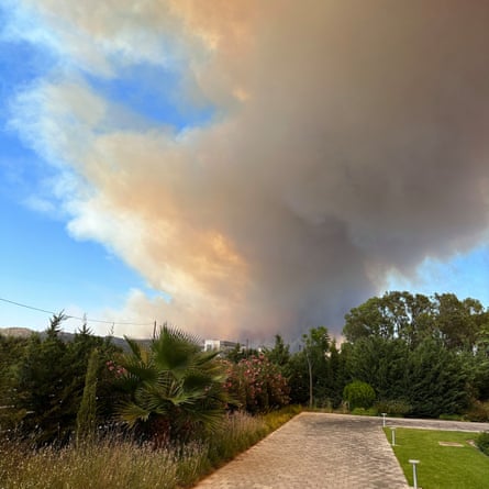 Smoke looms over the Atlantica Dreams resort.