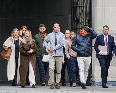 Relatives of the victims arrive at Liverpool town hall for the Southport inquiry hearing.