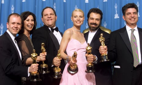The producers of the Miramax film Shakespeare in Love hold their Oscars with Gwyneth Paltrow, one of the latest women to come forward with accusations against Harvey Weinstein (third from left)