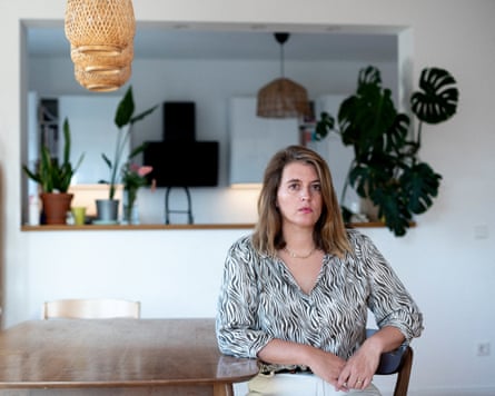 A photograph of Manon Garcia sitting in her home.