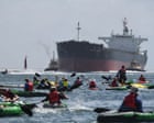 Rising Tide protest: climate activists stop three ships from entering world’s largest coal port in Newcastle