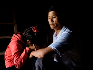 Thiên, 15, with her father: she escaped from five months in captivity in central China, aged 13.