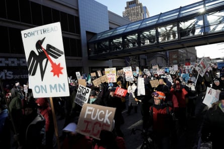 Demonstrators attend an ICE Out protest in Minneapolis on 30 January 2026.