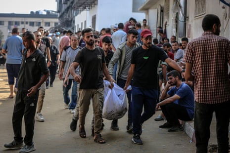 The bodies of Palestinian people killed by Israeli forces are being brought to al-Shifa hospital.