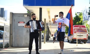 Supporters of Serbian tennis player Novak Djokovic at Melbourne International Airport.