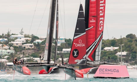 Oracle Team USA, left, beats Emirates Team New Zealand to the first mark in race six.