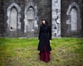 Doireann Ní Ghríofa in front of the boarded up psychiatric hospital.