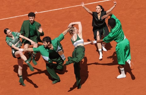 A scene of the opening ceremony, created by dancer and choreographer Benjamin Millepied, before the Women's final match between Mirra Andreeva and Maja Chwalinska.