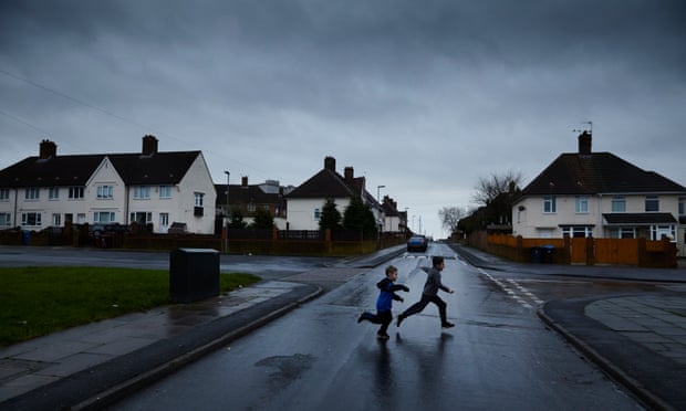 Boys playing in Pennard Avenue in Knowsley borough. Photograph: Christopher Thomond for the Guardian