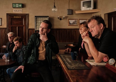 men sitting at a bar in Ken Loach’s The Old Oak