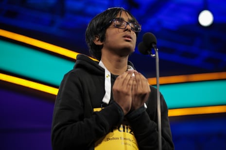 Faizan Zaki, 13, of Dallas, Texas spells a word in the semi-finals of the 2025 Scripps National Spelling Bee at the Gaylord National Resort and Convention Center.