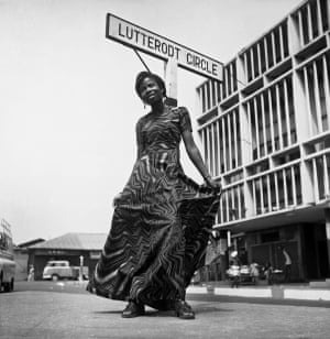 Naa Ayeley Attoh, in a psychedelic dress on Lutterodt Circle, near Jamestown