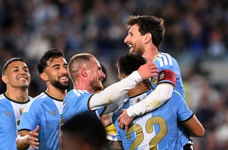 Lionel Messi celebrates his goal with teammates.