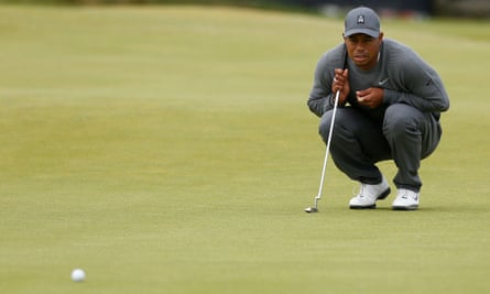 Tiger Woods lines up a shot on the second hole during the first day of The Open Championship 2015 at St Andrews.