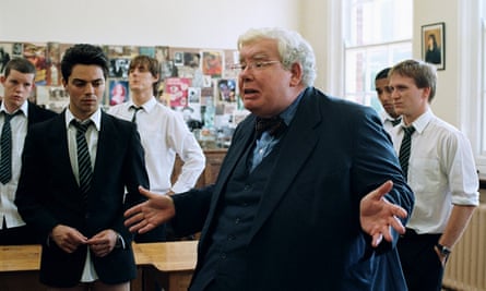 Dominic Cooper and fellow students with Richard Griffiths in a classroom 