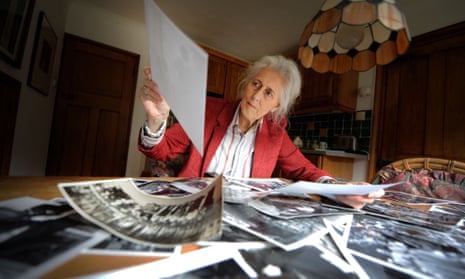 Grace Robertson sorting through her photographs in 2009.