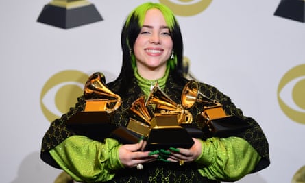 Eilish with her five Grammy trophy.