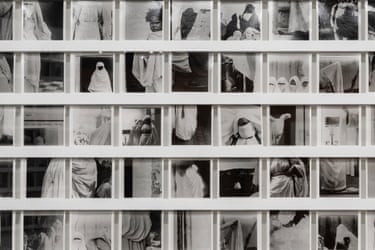 From The Fold: a grid of black-and-white photos shows veiled figures in white and dark robes