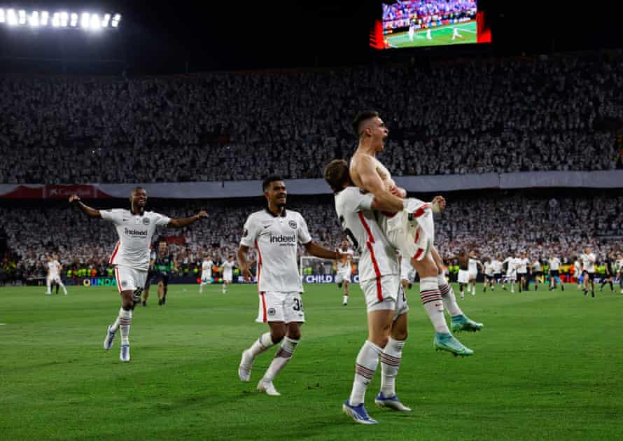 Eintracht Frankfurt's Rafael Santos Borre celebrates with Christopher Lenz and teammates after scoring the winning penalty during the shoot-out to win the Europa League.