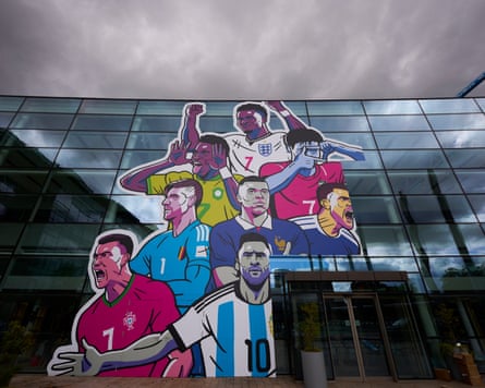 Illustrations of international footballers on the front of a BBC building in Salford