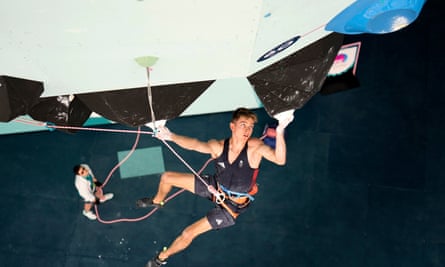 Toby Roberts competes in the climbing at the Paris Olympics.