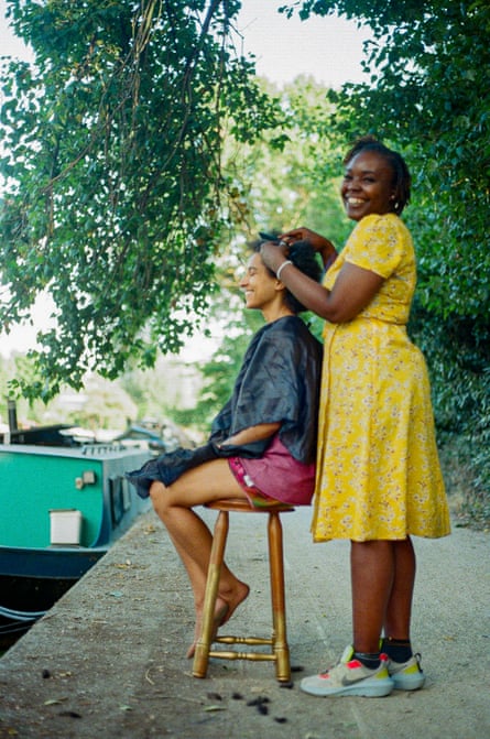 A tender moment of communion … a boater doing someone’s hair.