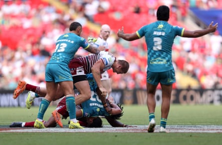 Sam Walters commits a foul on Bill Leyland