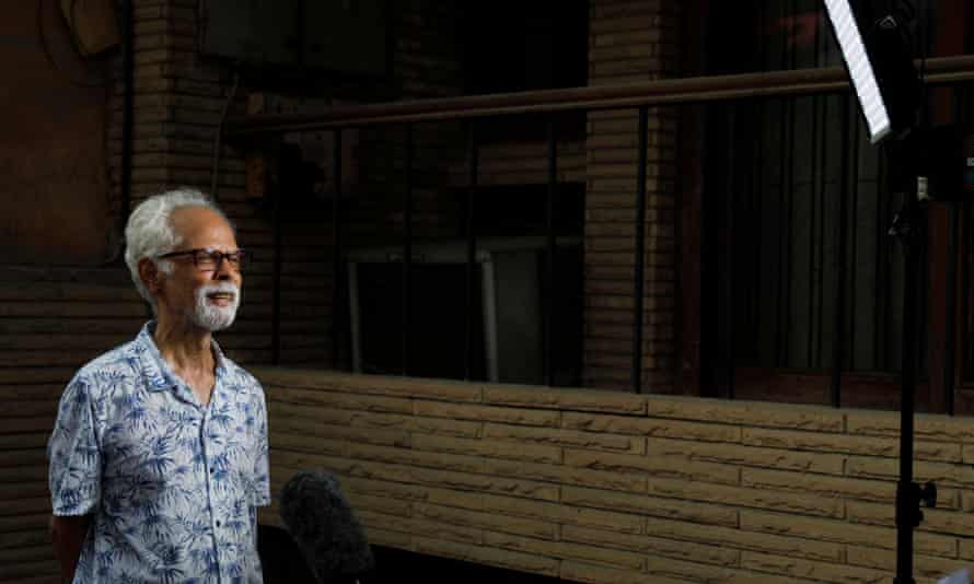 Gopalan Balachandran speaks on 12 August 2020 to the media outside his home in New Delhi, India.