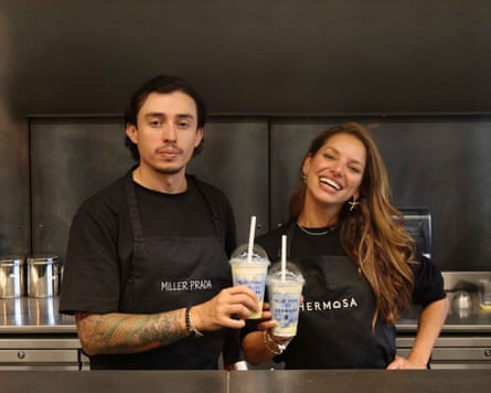 Chef Miller Prada and Erika Tamayo hold up the Miller Prada x Hermosa shake.