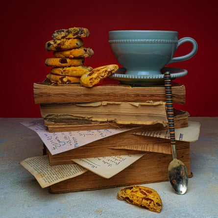 chocolate chip cookies on a stack of recipe books