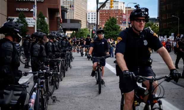Police use bicycles to create cordons around protesters ahead of Republican National Convention in Cleveland