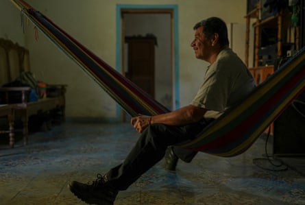 José Hernández rests in a hammock at home