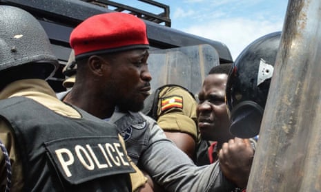 Robert Kyagulanyi, commonly known as Bobi Wine, being arrested by police