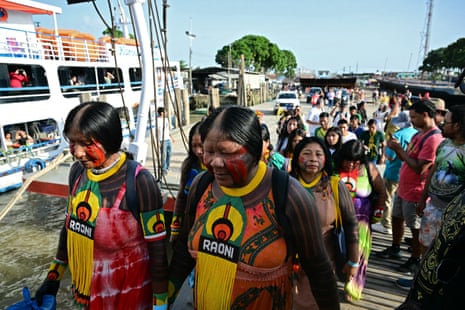 Members of the Raoni tribe join hundreds of other indigenous activists and forest defenders to protest at Cop30